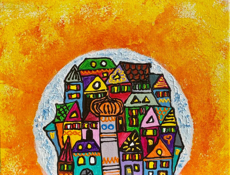 Peinture d'une ville colorée dans une bulle blanche sur fond orange soleil